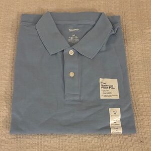 Light blue men’s polo NWT size (M)
